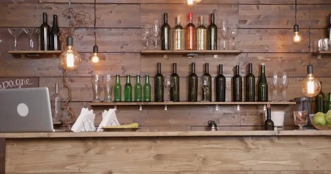 Slide shot from left to right of an empty bar counter Stock Footage 103590503