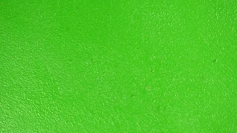Slide shot of a painted wall surface. Macro dolly texture green surface as a  Stock-Footage 204707268