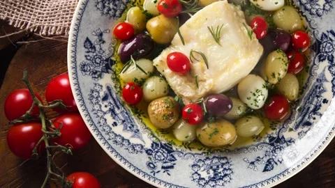 Slide shot Portuguese dish with codfish called Bacalhau do Porto Video stock 142232982