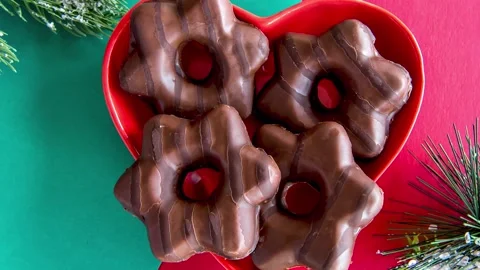 Slide show of Christmas cookie or gingerbread on red and green background Stock Footage 166178707