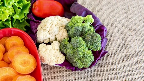 Slide show of Vegetable table, carrots, boccoli, cauliflower, lettuce, tomat Stock Footage 165847647