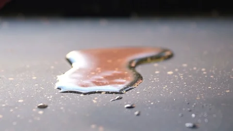 Slide slow motion shot of flip rib eye steak on grill pan Stock Footage 115777623