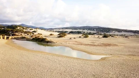 Slide su dune piscinas con laghetto Stock Footage 80610877