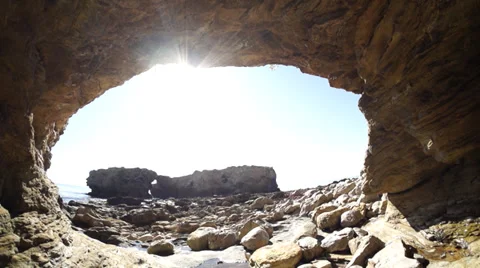 Slide Through Beach Cave Video stock 31962298