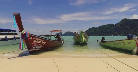 Slide video of the beach with boats at Phi-Phi island. Drone video of Video stock 75726476