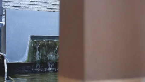 Slide view slow motion footage of water fountain manmade Stock Footage 100408095