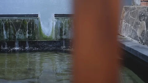 Slide view slow motion footage of water fountain manmade Stock Footage 100409081