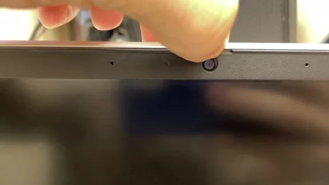 Slide Webcam. Open cover for an electronic device with a finger. Stock Footage 235158676