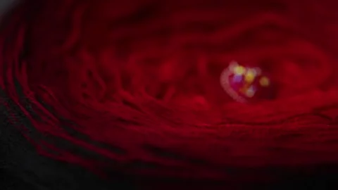 Slider closeup of gradient colored yarn skein with detailed textile fibers Stock Footage 322143174