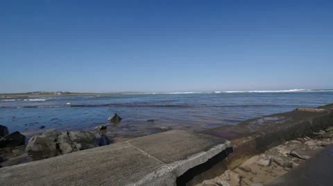 Slider Motion and Pan across Doonbeg Stock Footage 37348174