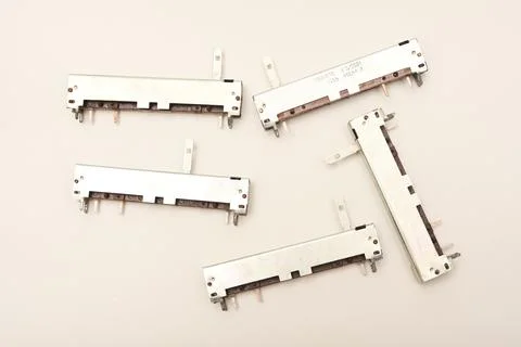 Slider potentiometers. Variable resistors. Devices for voltage changes. 스톡 사진