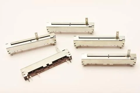 Slider potentiometers. Variable resistors. Devices for voltage changes. Stock-Fotos