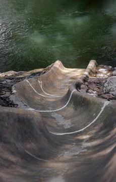 Slider ramp down surrounded by nature for Playing in the stream. Stock Photos