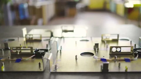 Slider shot of a blank metal components in workshop laboratory Stock Footage 154864452