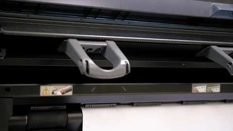 Slider shot of large format printer at printing factory for publishing Stock Footage 108964831