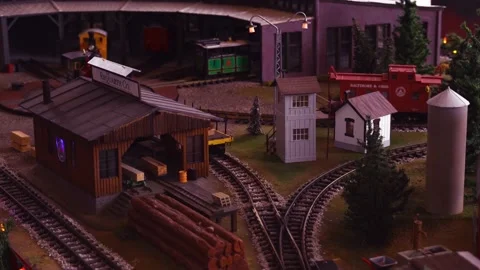 Slider shot of model toy train lumber yard Stock Footage 135950293