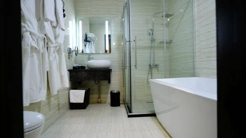 Slider shot of Modern Tiled Bathroom with Shower in modern home Stock-Footage 306999434