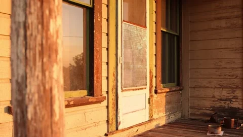 Slider shot of the porch of an old ghost town building with shallow DOF Stock Footage 201186789