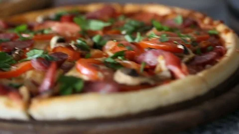 Slider shot of table with 3 pizza. Close up Stock Footage 70432838