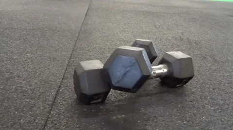 Slider shot of two dumbbells Stock Footage 54372307