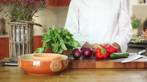 Slider show with chef in front of fresh vegetables Stock Footage 59888689