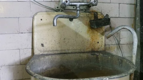 Slider view of old, dusty, rusty sink. Lost place Stock Footage 92264033