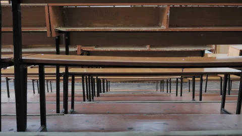 Slider View Of Under Chairs In Empty Lecture Hall  Stock Footage 127823770