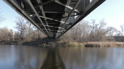 Slider View Under The Railway Bridge Across The River Stock Footage 255579705