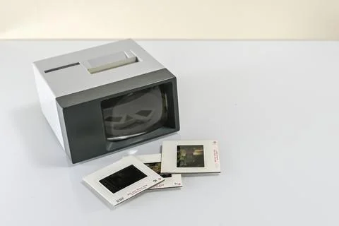 Slides scattered on a table and slide viewer 11 Stock Photos
