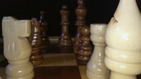 Sliding between rows of chess pieces towards the black king Stock Footage 170752338