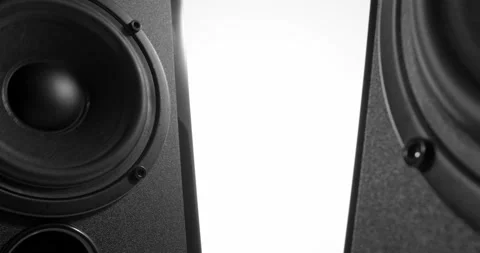 Sliding between two speakers with vibrating bass membranes Stock Footage 155858995