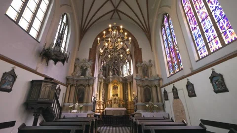 Sliding camera movement inside historic St. Anne's Church in Vilnius Stock Footage 334676456