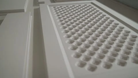 Sliding camera view over white wooden door air vent Stock Footage 300129877