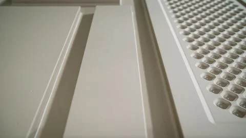 Sliding camera view over white wooden door air vent Stock-Fotos