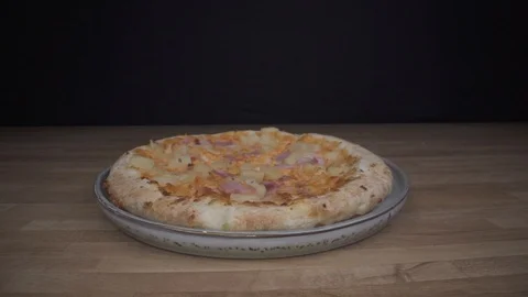 Sliding up close to Pizza  on table dolly in Stock Footage 124016584