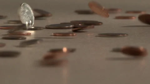 Sliding coins. Closeup. Video stock 50632722