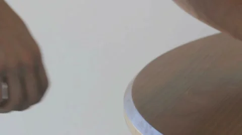 Sliding coins off a table Stock Footage 8156266