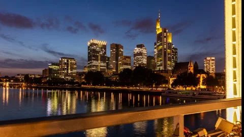 Sliding Day to Night time lapse of the skyline of Frankfurt Stock Footage 142087428