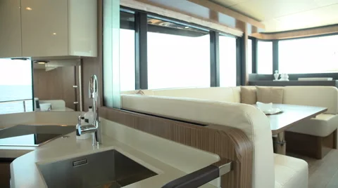 Sliding door closing between kitchen and living room on a yacht Stock Footage 53431508