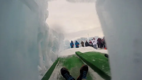Sliding Down an Ice Slide Ice First Vídeos de archivo 72686666
