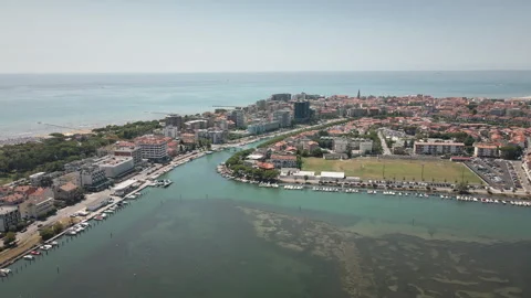 Sliding drone lateral right across Grado town and central canal 4K 스톡 동영상 331349267
