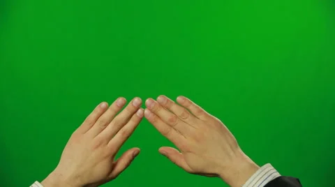 Sliding hands on a green screen.FULL HD. Stock Footage 42000448