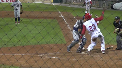 Sliding into Home Base Stock Footage