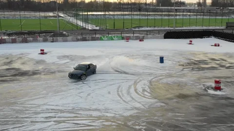 Sliding on an ice line. Snow drifting. snowy land road at winter Aerial Stock Footage 253435573