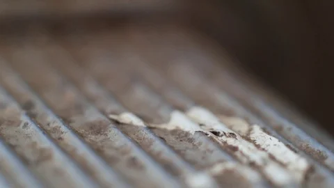 Sliding macro shot of an old metallic ladder Video stock 128942741