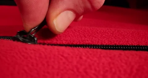 Sliding open the slider on a red material. Stock Footage 168251775