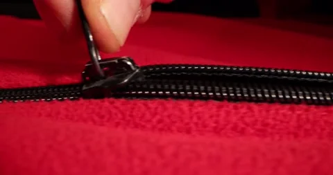 Sliding open the slider on a red material. Stock Footage 168251811