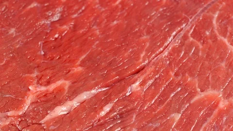 Sliding over marble beef, low angle. Meat texture, background. Dolly shot. Stock Footage 121226224