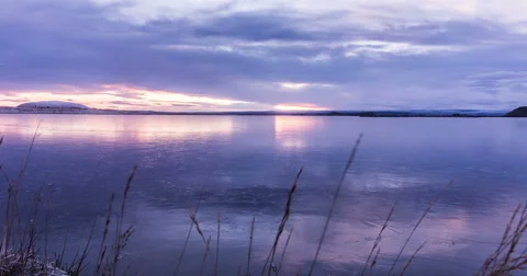 Sliding pan scene of frozen lake melting in Iceland - myvatn Lake 스톡 동영상 57511853