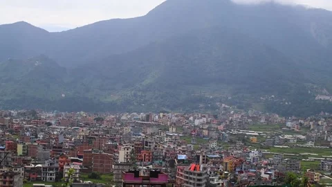Sliding panoramic view of Chobar and the hills behind Kirtipur 스톡 동영상 211798592